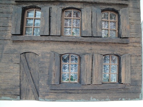 Detail van afgebouwd huis voor gebruik achterwand